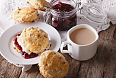 Biscuits with jam and tea
