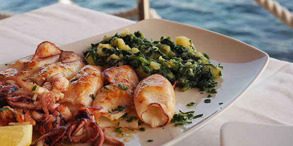 Grilled squid with boiled potatoes and chard