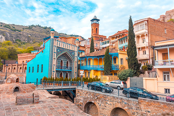 Architecture of the Old Town of Tbilisi, Georgia, in Abanotubani area. Domes of sulfur baths, carved balconies