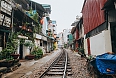 Empty railroad between buildings in Hanoi