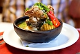 Chilean cazuela soup served in traditional clay bowl