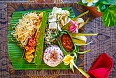 Traditional Indonesian dishes served on a banana leaf