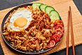 Nasi Goreng: A popular Indonesian fried rice which is traditionally served with a fried egg. 